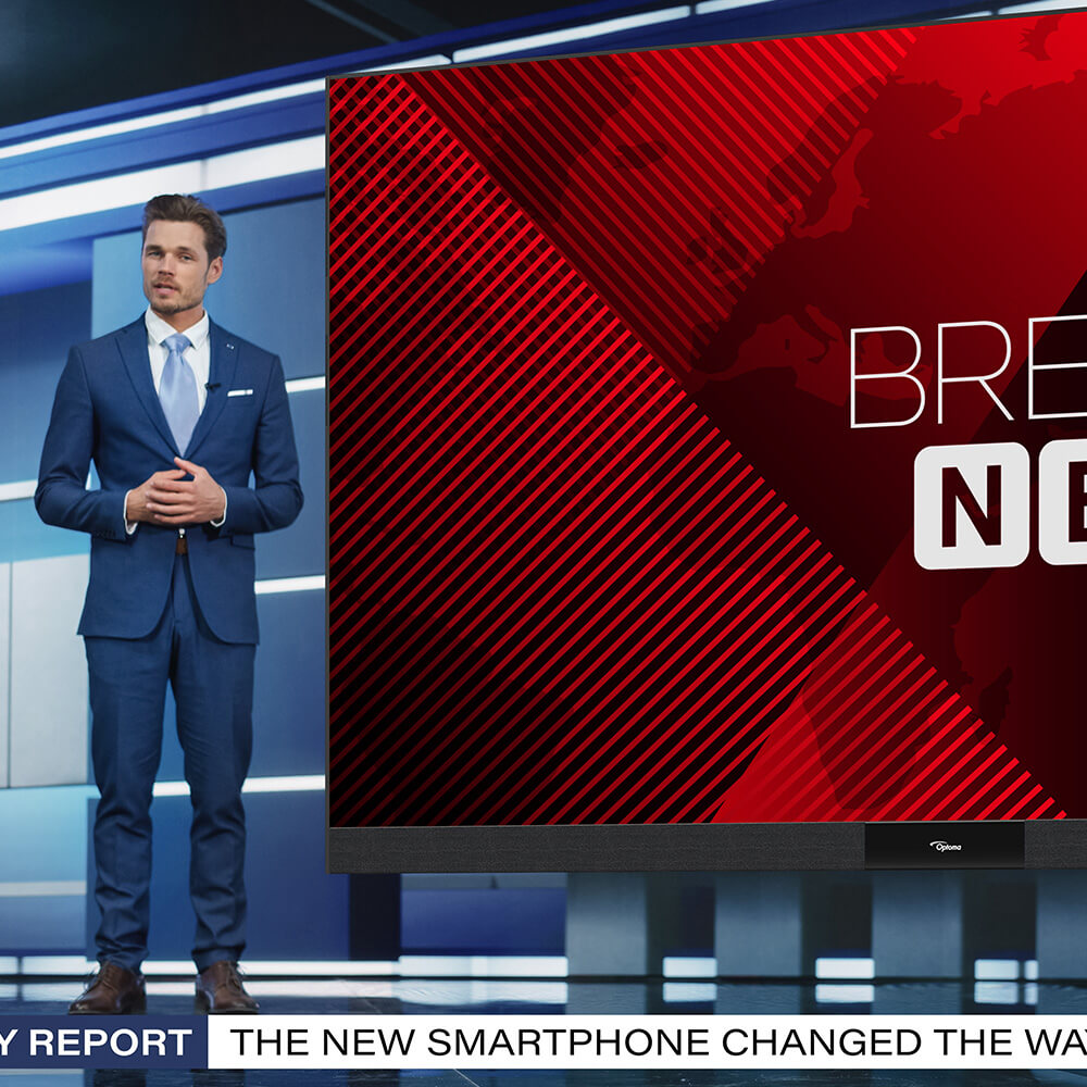 Professional broadcast studio with LED video wall displays and news presentation technology. High-definition newsroom display systems enable live television production, breaking news coverage, and media broadcasting with studio-grade visual technology and professional presentation environments.